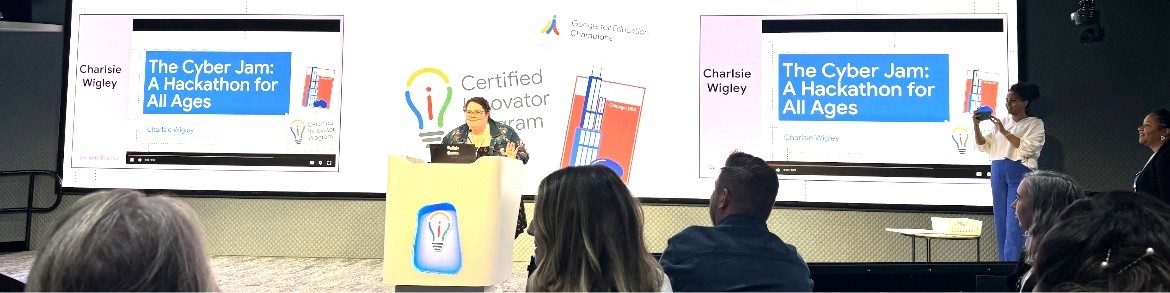 Charlsie at the podium pitching The Cyber Jam: A Hackathon for All Ages at the Google Certified Innovator Program in Chicago